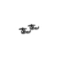 Black mustache-shaped cufflinks on a white background
