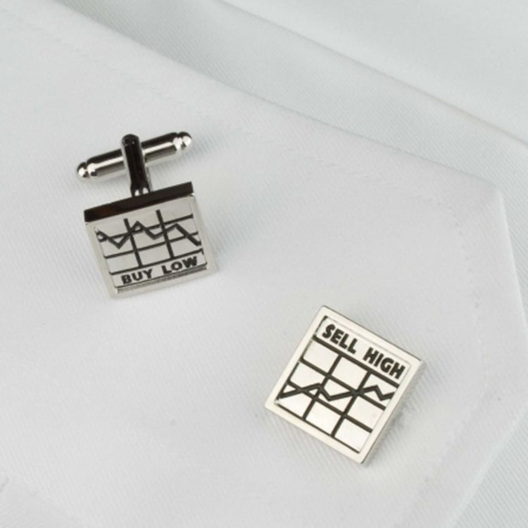 Cufflinks with 'Buy Low' and 'Sell High' design on a light gray background