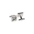 Cufflinks with 'Sell High' text and stock market diagram on a white background