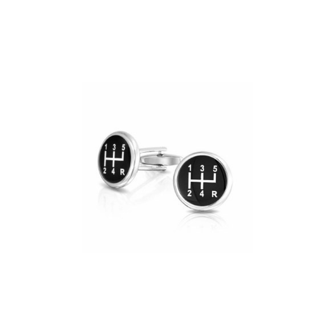 Cufflinks with gear shift design on a white background