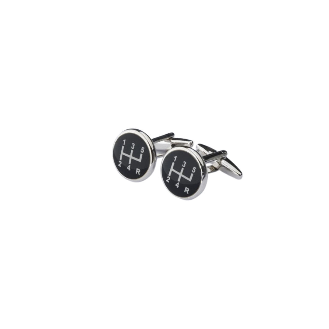 Cufflinks with gear shift design on a white background