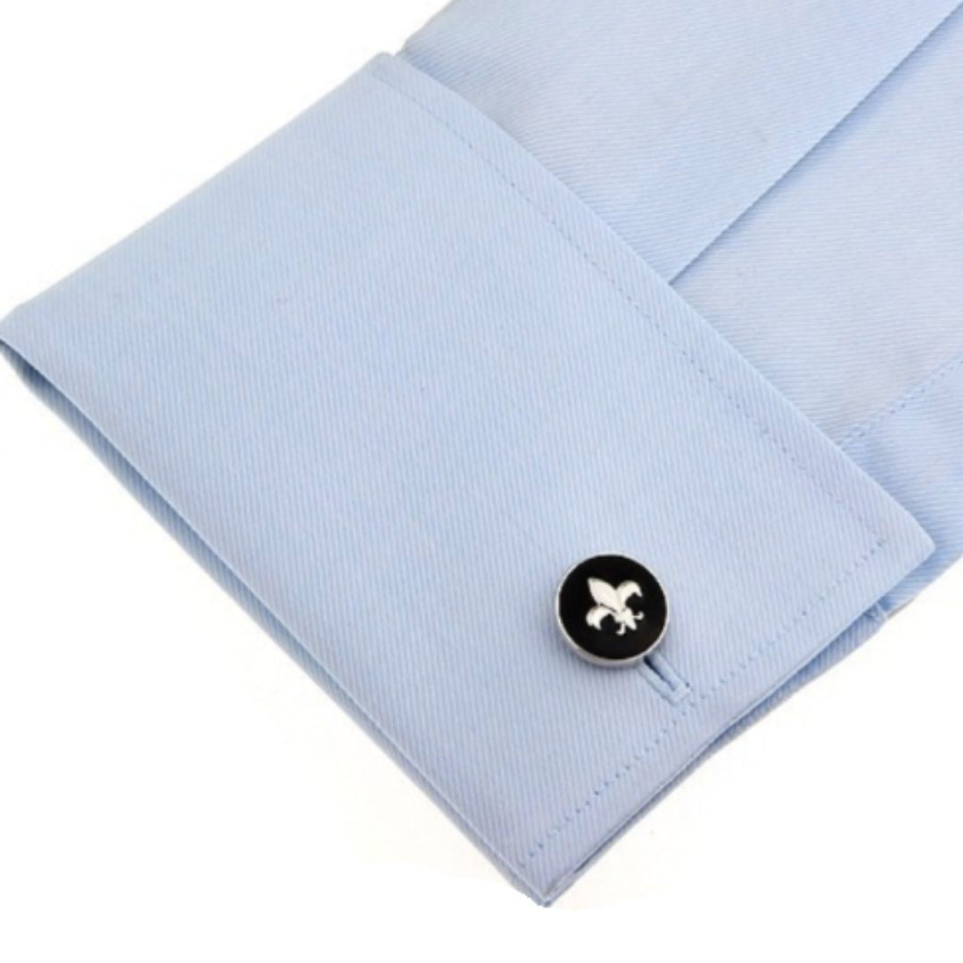 Fleur de lis Cufflink on a light blue shirt cuff