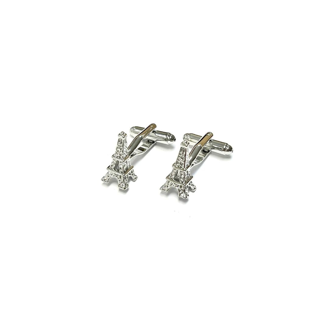 Pair of silver Eiffel Tower cufflinks on a white background