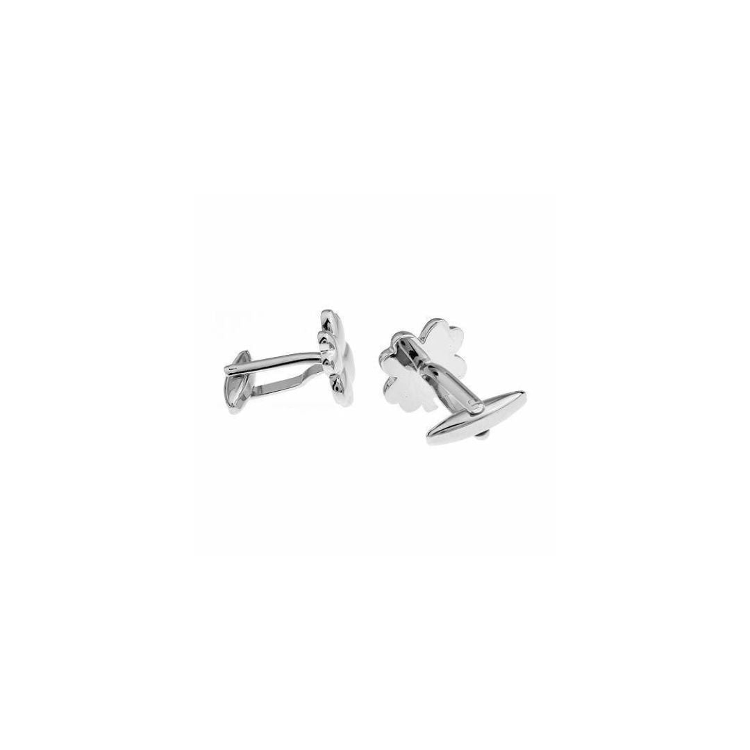 Pair of silver four clover cufflinks from the back on a white background