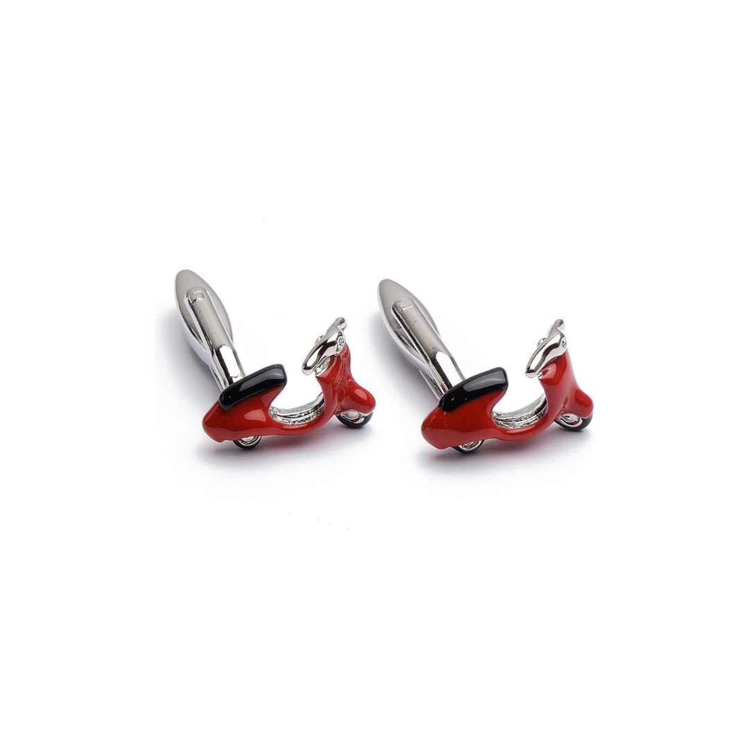 Red scooter-shaped cufflinks on a white background