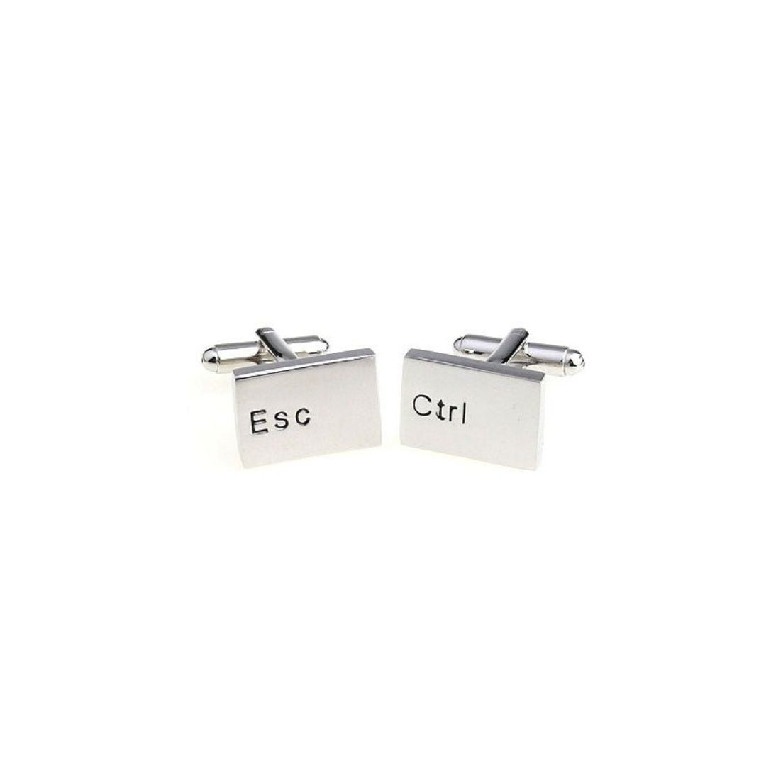 Silver cufflinks with 'Esc' and 'Ctrl' engravings on a white background