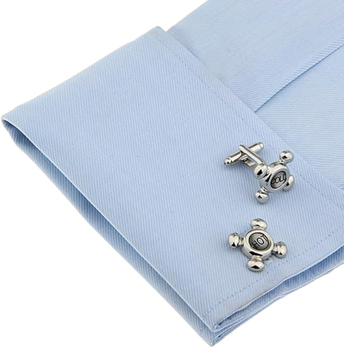 Silver cufflinks with 'Hot' and 'Cold' labels on a blue shirt