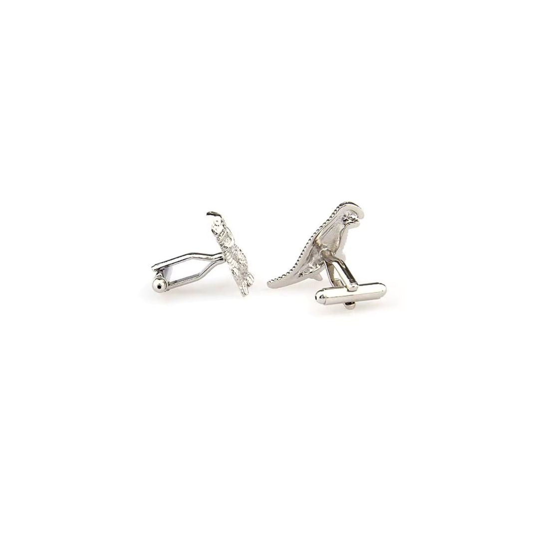 Silver dinosaur-shaped cufflinks from the back