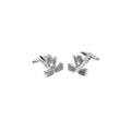 Silver golf clubs and ball cufflinks on a white background