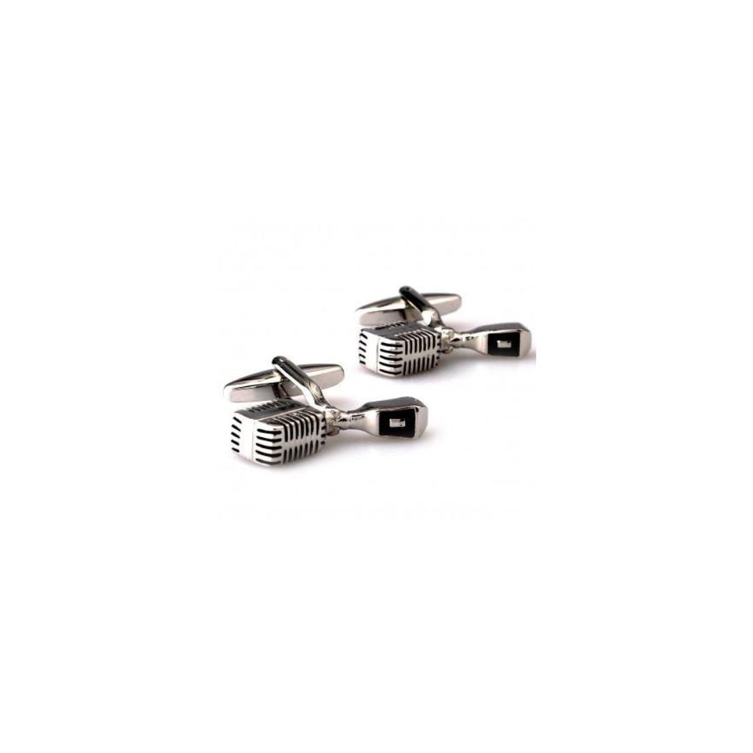 Silver microphone-shaped cufflinks on a white background