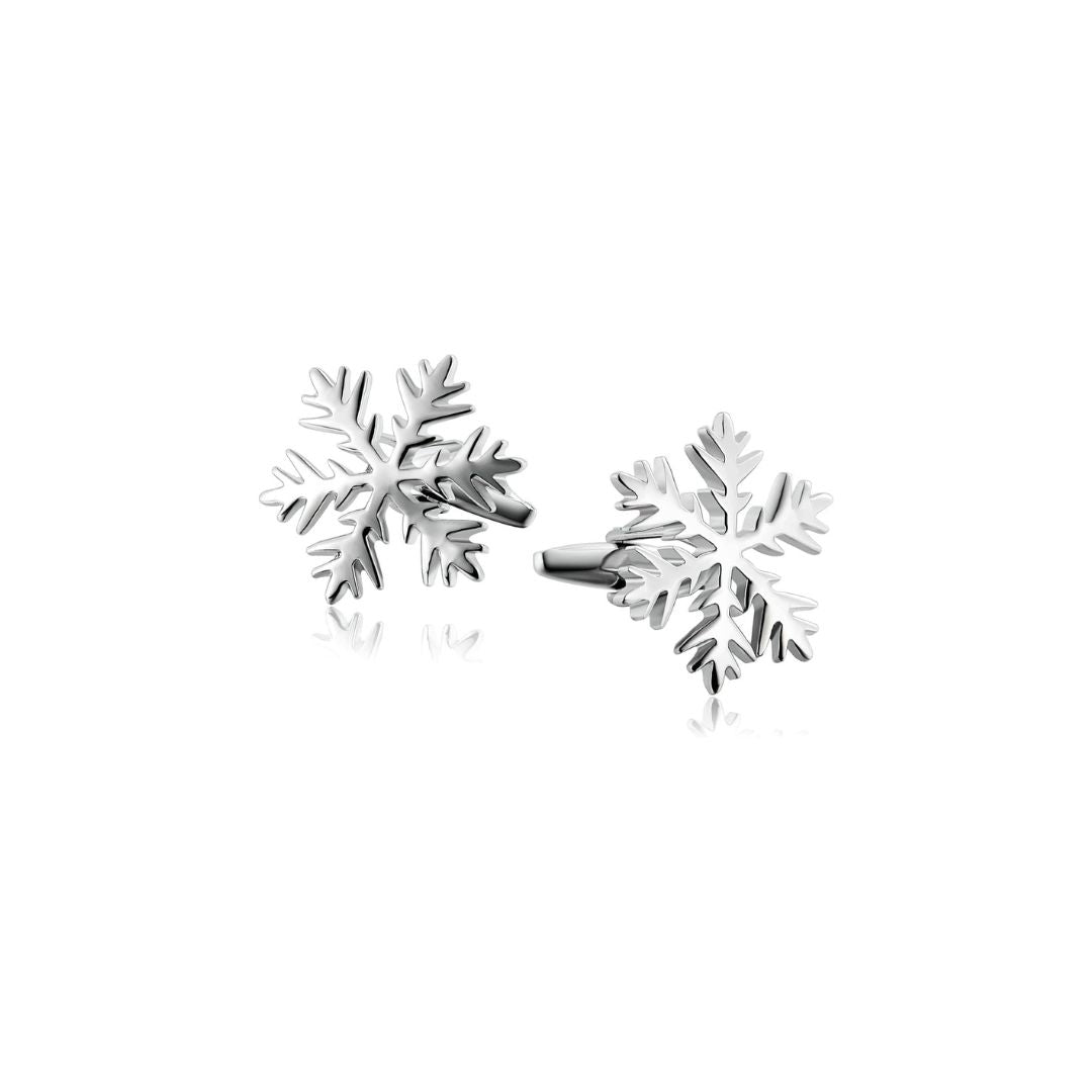 Silver snowflake cufflinks on a white background