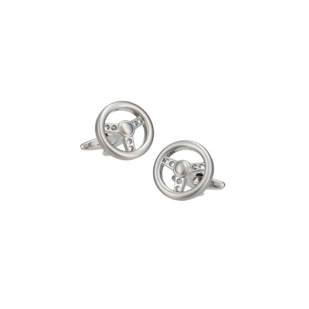 Silver steering wheel cufflinks on a white background