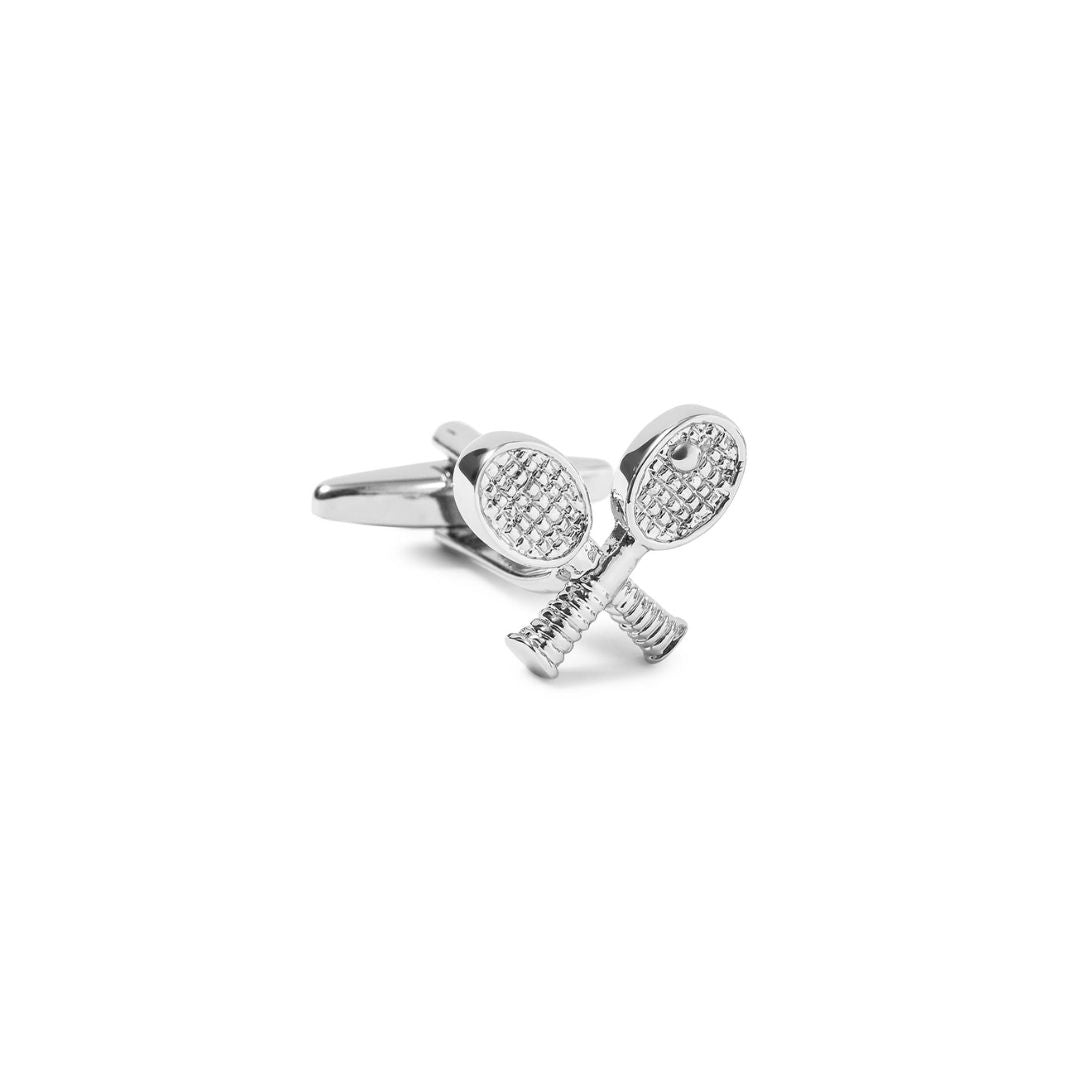 Silver tennis racket and ball cufflinks on a white background