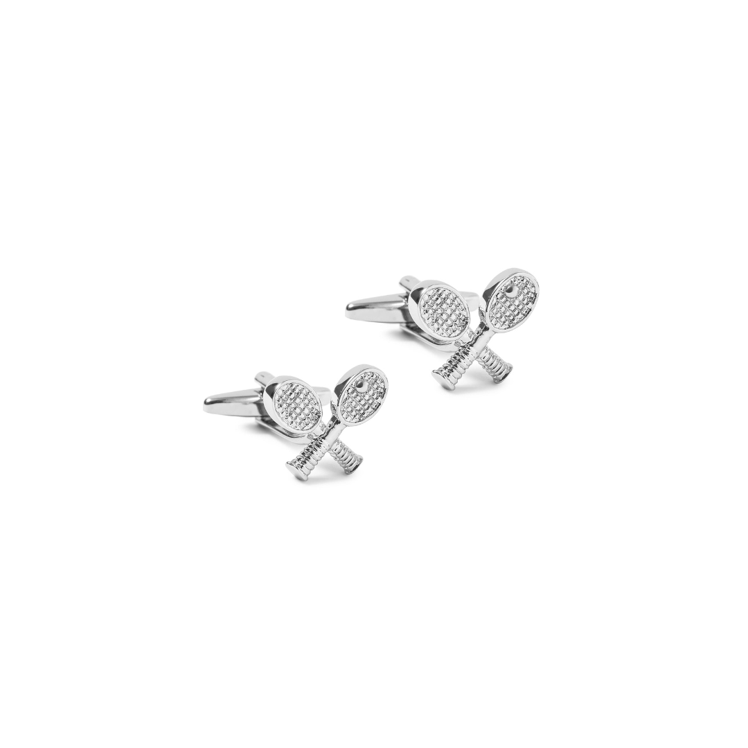 Silver tennis racket cufflinks on a white background