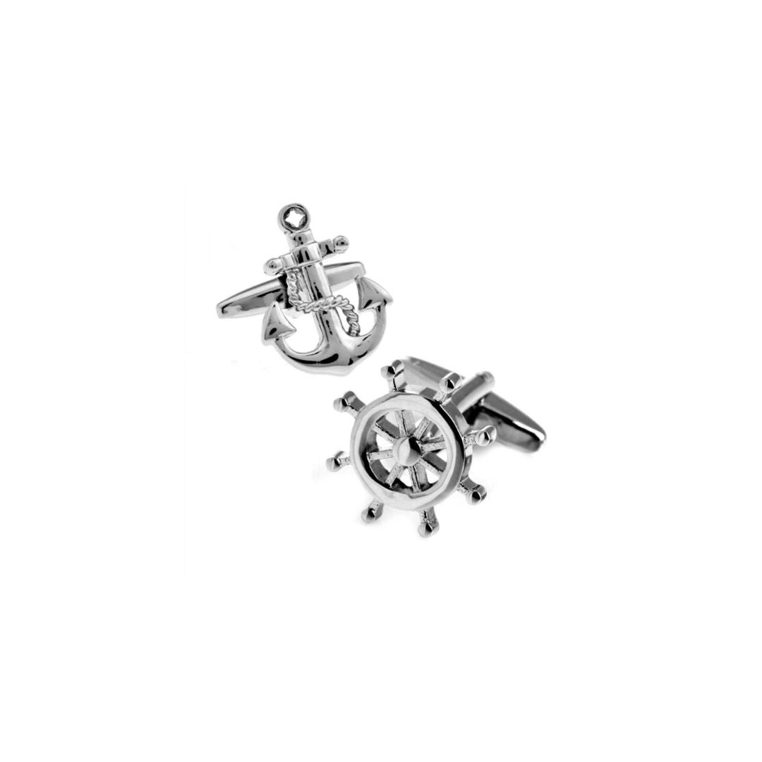 Two silver cufflinks with an anchor and steering wheel design on a white background